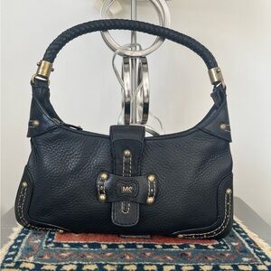 Michael Kors Black Vintage Shoulder Bag with Gold Accents .